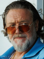Russell Crowe wears David Beckham DB7102 sunglasses in The Get Out.