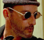 Jean Reno wears round sunglasses in the 1994 cult classic Léon: The Professional.