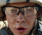 Joe Alwyn wears a pair of Oakley Radar Path protective glasses in Billy Lynn's Long Halftime Walk.