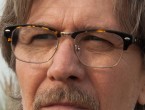 Gary Oldman wears eyeglasses very similar to Ray-Ban 5154 Clubmaster Optics eyeglasses in the movie Criminal