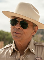 Zahn McClarnon wears Ray-Ban Outdoorsman sunglasses in Season 4 of the series Dark Winds 