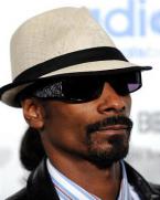 Snoop Dogg wearing black Serious Pimp OG Bandana sunglasses