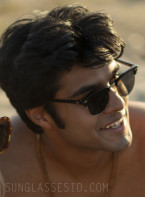 Shubham Maheshwari wears black sunglasses in the series We Were Liars (2025).