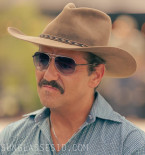 Max Casella wears KBL Silver City sunglasses in the series Tulsa King (2023).