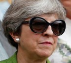 British Prime Minister Theresa May wears Bvlgari sunglasses during the Wimbledon Men's finals on July 16th 2017.