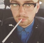 Sam Smith wearing Dita Statesman eyeglasses