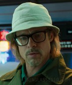Brad Pitt wears black Police Origins Bullet 1 VPLE37 eyeglasses in Bullet Train.