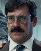 Jon Hamm wears a pair of steel aviator eyeglasses in the 2023 movie Corner Office.