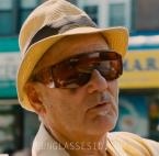 Bill Murray, cool as ever, with large shield sunglasses in St. Vincent.