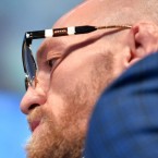 Conor McGregor wears Gucci GG0603 002 eyeglasses in the press events leading up to his fight with Dustin Poirier.
