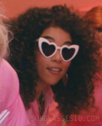 Alexandra Shipp wears white or light pink heart-shaped sunglasses in Barbie.