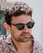 Theo James wears Oliver Peoples Gregory Peck 1962 Folding sunglasses in The White Lotus.