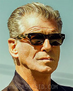 Pierce Brosnan wears Oliver Peoples Isba OV5376S in the hitman film Fast Charlie.