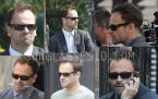 Jonny Lee Miller (as Sherlock Holmes) wearing a pair of Persol sunglasses in the