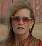 Laura Dern wears Pink sunglasses in Jurassic World: Dominion.