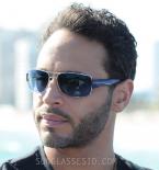In Graceland, the main character Paul Briggs, played by Daniel Sunjata, wears a 