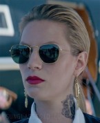 Iva Babić wears gold Ray-Ban RB3857 Frank sunglasses in The Machine (2023).