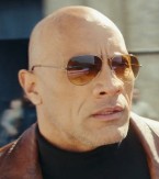 Dwayne Johnson wears Ray-Ban RB3025 Aviator sunglasses in the 2021 movie Red Notice.