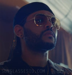 The Weeknd wears a pair of Ray-Ban RB3029 Outdoorsman II in the HBO series The Idol (2023) and the music video Double Fantasy.