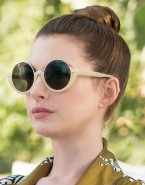 Anne Hathaway wears Marni ME614S round semi-rim sunglasses in The Hustle.