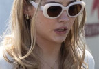 Madelyn Cline wears white Coach HC8391 sunglasses in I Know What You Did Last Summer.