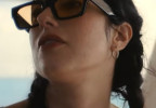 Taylor Ortega wears Le Specs Shmood sunglasses in the series Big Mistakes.