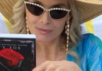 Michelle Pfeiffeis wearing Swarovski SK7030 sunglasses on the set of the series Margo's Got Money Troubles.