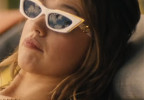 Aimee Lou Wood wears white and gold Valentino Garavani VLS113D sunglasses in the The White Lotus Season 3.