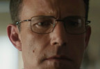 Ben Affleck wears black rectangular eyeglasses in The Accountant 2 (2025).