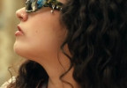 Asha Banks wears Justine Clenquet SSENSE Exclusive Khaki Jenny Camo sunglasses in Your Fault: London.