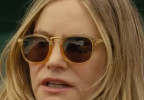 It looks like Jennifer Jason Leigh is weaing Krewe Franklin sunglasses in Poolman.