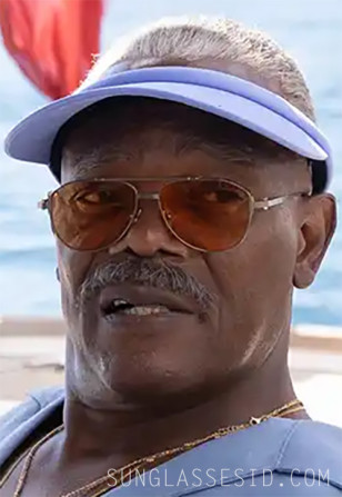 Samuel L. Jackson wears Akoni Helios sunglasses in Just Play Dead.