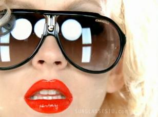 Close up of Christina Aguilera wearing the Carrera Endurance sunglasses
