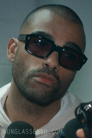 Toby Sandeman wears a pair of black Cutler and Gross 9495 sunglasses in Episode 4 of Season 2 of Running Point.