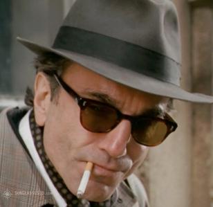 Daniel Day-Lewis wearing sunglasses in the movie Nine
