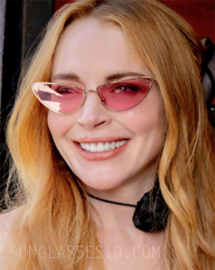 Lindsey Lohan wears Dior MissDior B1U cat-eye sunglasses in Freakier Friday.
