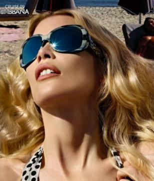 Claudia Schiffer wearing Dolce & Gabbana 4033 sunglasses in an advertisement for