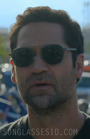 Manuel Garcia-Rulfo wears Ermenegildo Zegna EZ0231 sunglasses in Episode 10 of Season 4 of The Lincoln Lawyer.