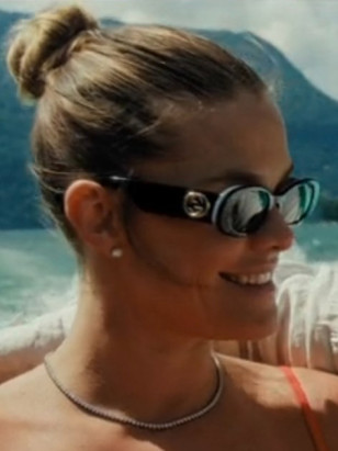 Nina Agdal wears Gucci GG0517S sunglasses in the HBO Max series Paul America, episode 4.