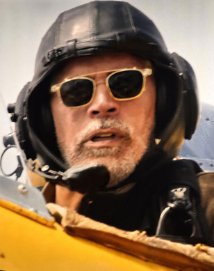 Esai Morales as Gabriel wears a pair of sunglasses during the red and yellow airplane sequence in Mission: Impossible - The Final Reckoning.