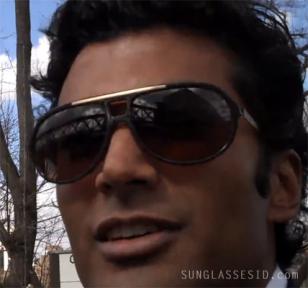 Sendhil Ramamurthy with the Lacoste sunglasses in a backstage video shot by dire