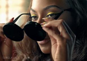 Beyonce with Linda Farrow Jeremy Scott Mickey Mouse sunglasses in Telephone