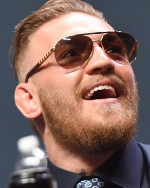 Conor McGregor wearing Louis Vuitton Attitude Pilote Z0339U sunglasses in July 2015