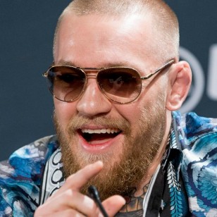 Martial artist Conor McGregor wears Louis Vuitton Conspiration Pilote Canvas Z0202U sunglasses.