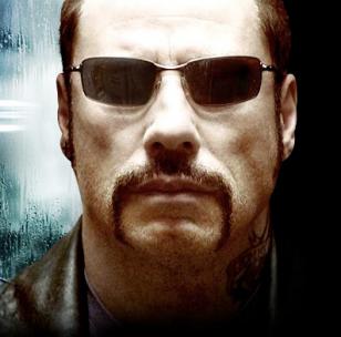 John Travolta, as Ryder wearing Oakley Square Wire in The Taking of Pelham 12