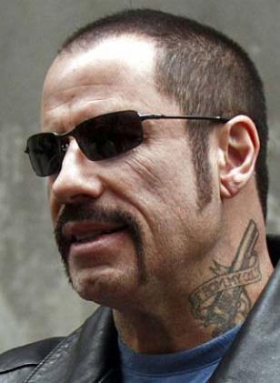 John Travolta wearing Oakley Square Wire in The Taking of Pelham 123