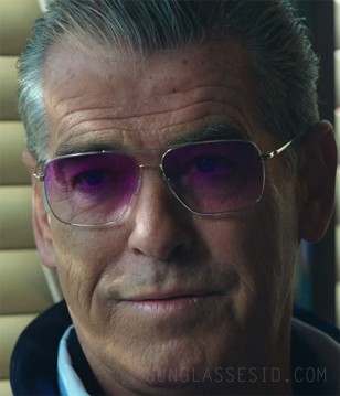 Pierce Brosnan wears Oliver Peoples Clifton sunglasses with pink gradient lens in Urge