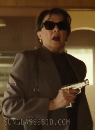 Annette Bening wears Oliver Peoples Kienna OV5526SU sunglasses in Lucky.