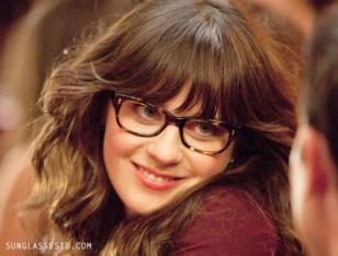 Zooey Deschanel (as Jess) wears a pair of Oliver Peoples Wacks eyeglasses in the