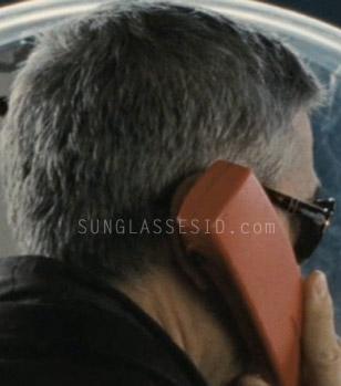 George Clooney wearing Persol 2883 sunglasses in the movie The American